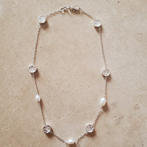 Silver and Pearl Necklace With Flowers