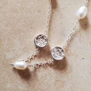 Silver and Pearl Necklace With Flowers