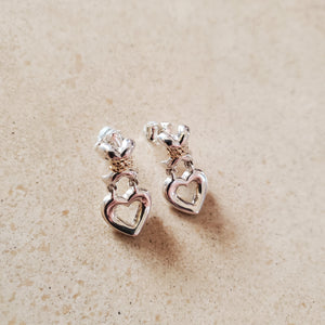 Silver X with Dangling Heart